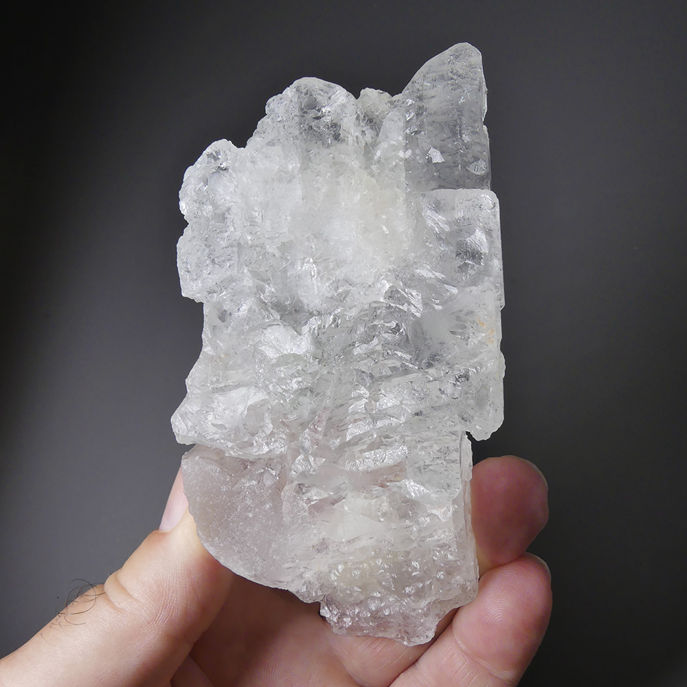 Petalite (Castorite) – Large Gem-Clear Crystalline Mass with Etched Faces and Included Green Tourmaline