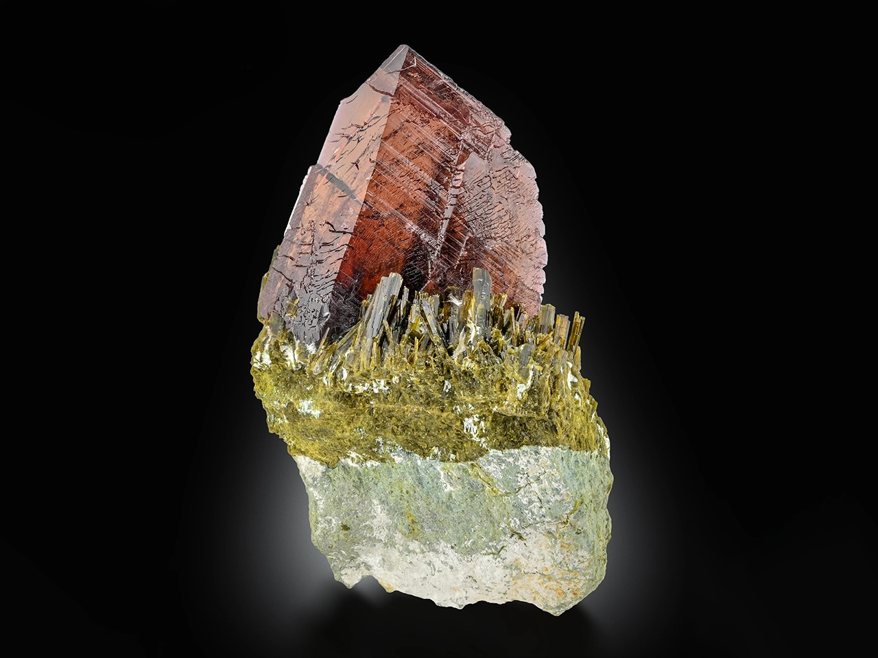 Axinite with Epidote – Lustrous Copper-Brown Gem Crystal Rising from Emerald-Green Epidote Matrix