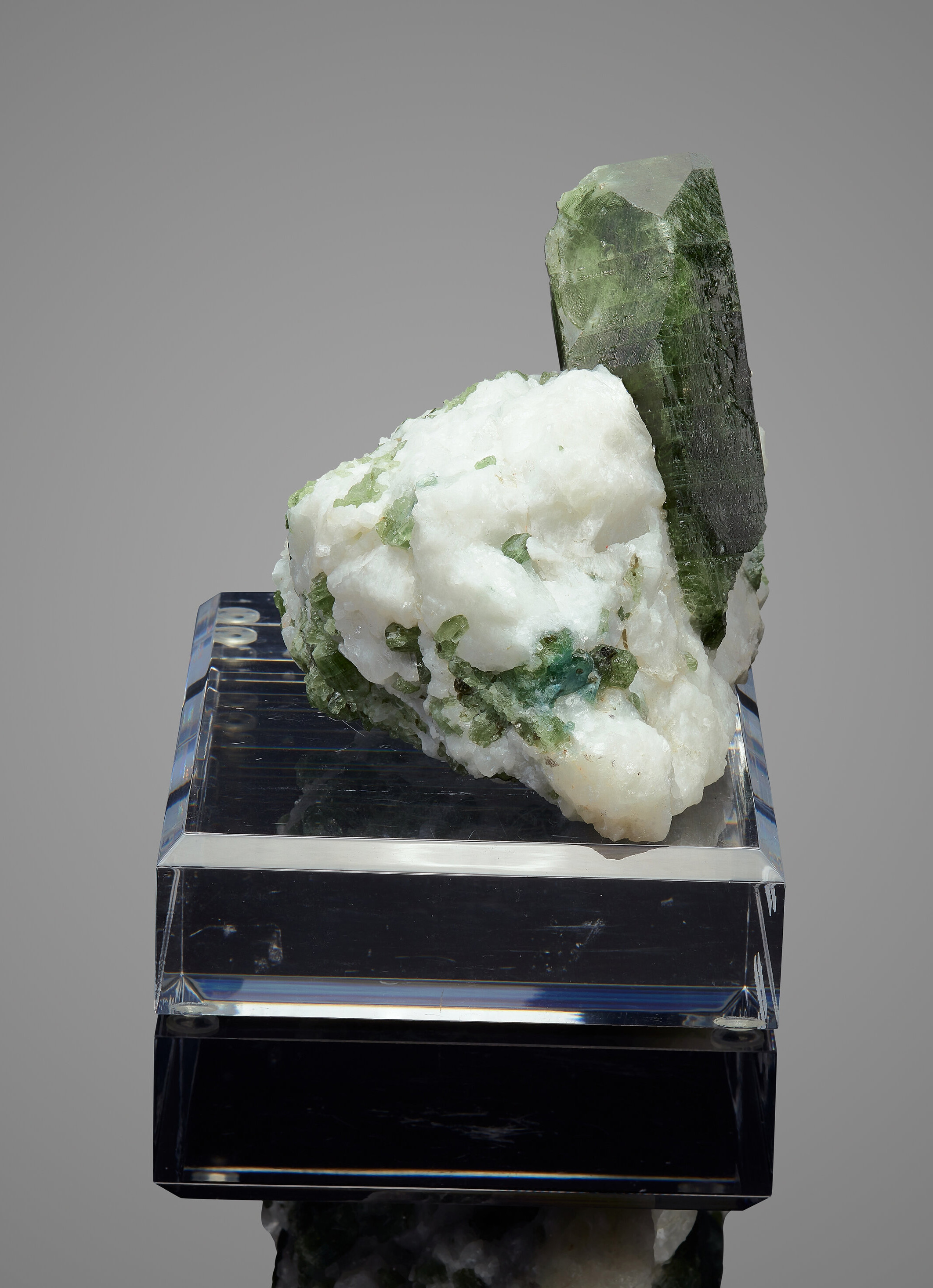 Diopside on Calcite – Monumental Isolated Green Prismatic Crystal on White Fluorescent Matrix