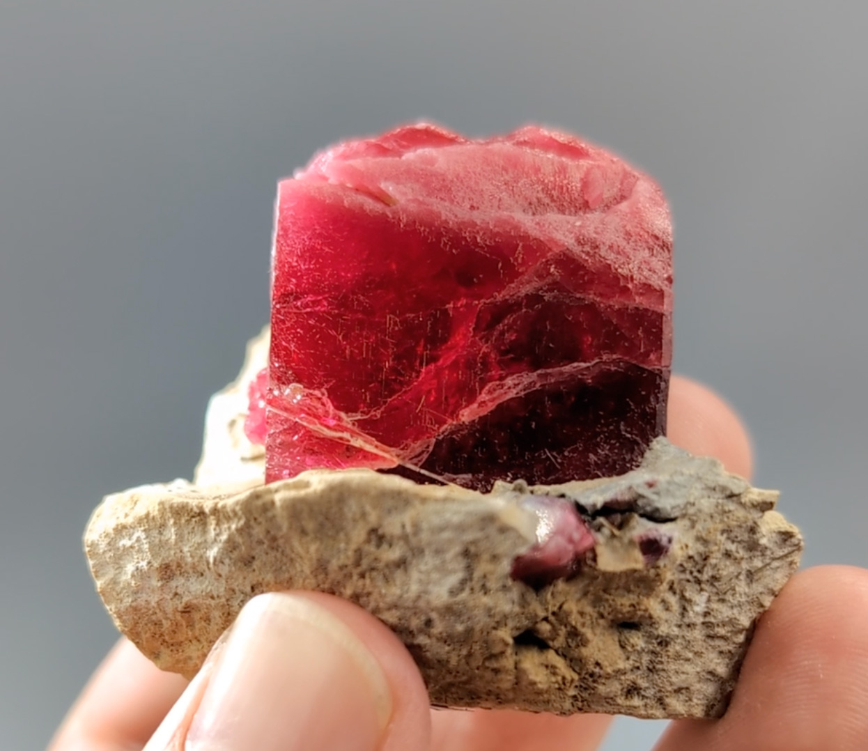 Rhodonite – Deep Cherry-Red Lustrous Crystal on Matrix