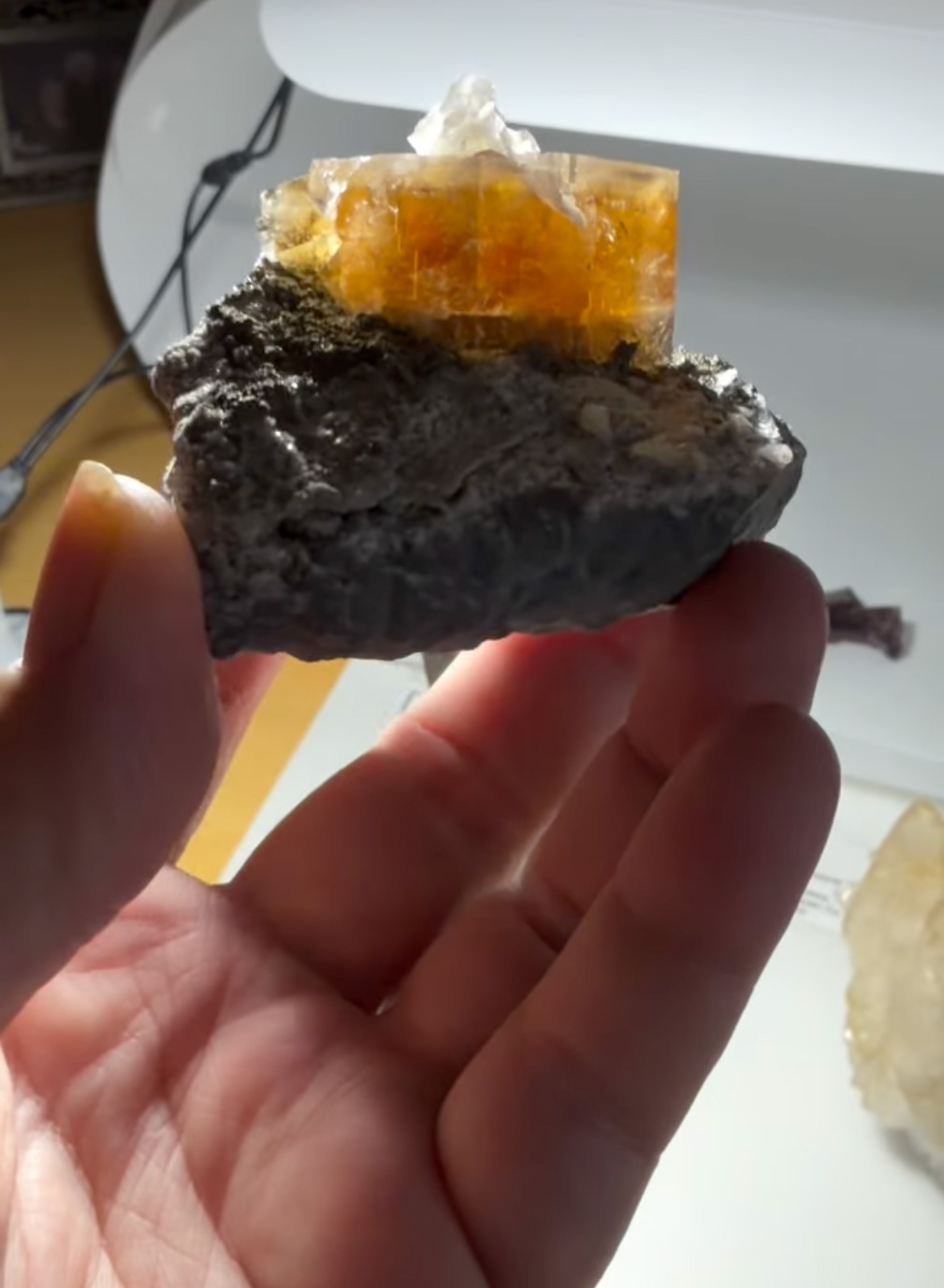 Fluorite with Celestine - Gemmy Amber Cube with Internal Celestine Blade on Carbonate Matrix